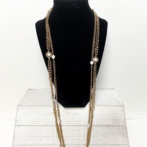 Long statement gold necklace